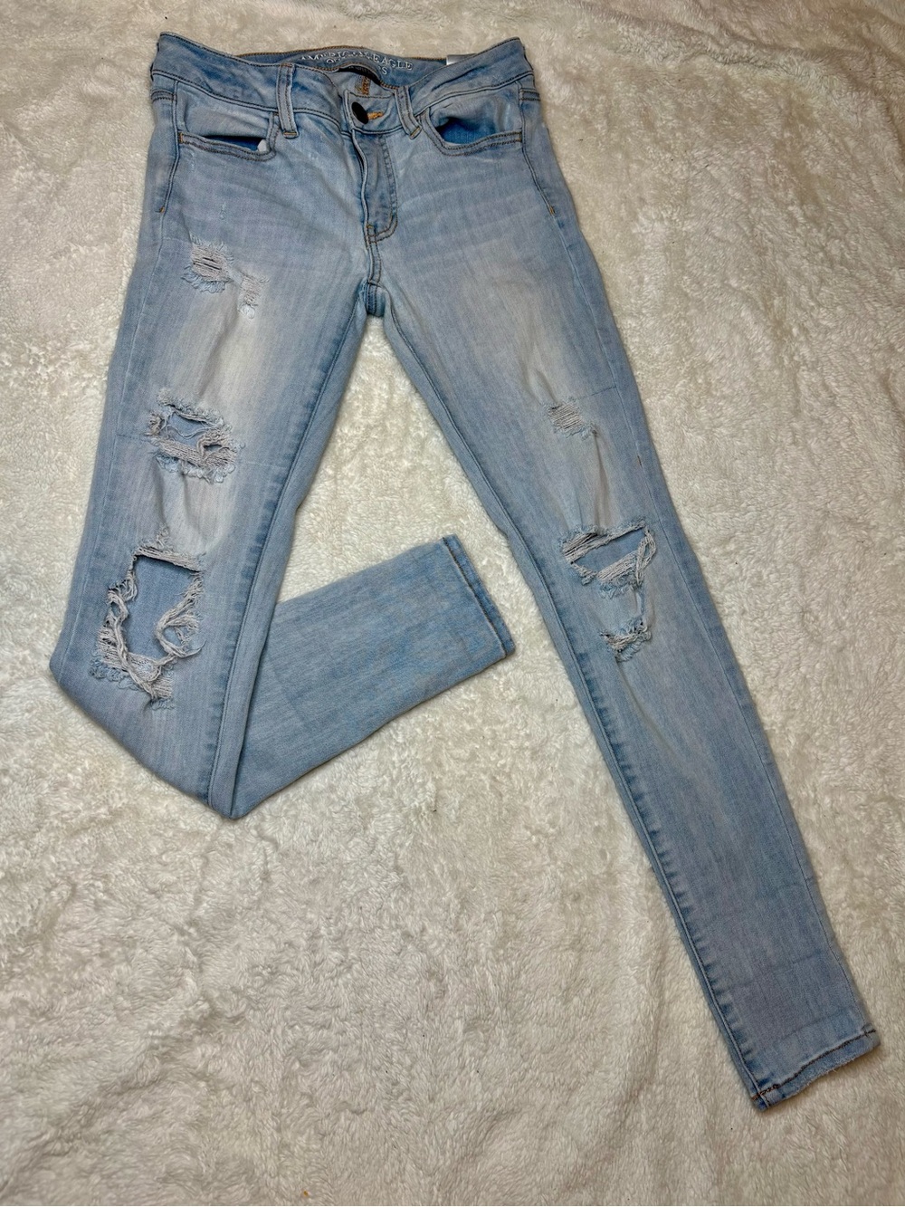 AEO Denim Cafe Super Super Stretch Light Blue Distressed Jeggings